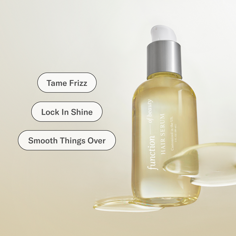 Hair serum bottle with text on a light background